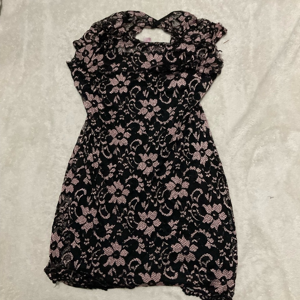 Black mess dress with flower patterns.